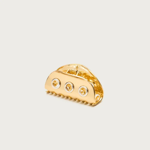 Metallic grommet claw hair clip