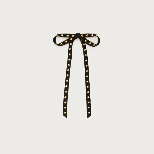 Studded leather hair bow